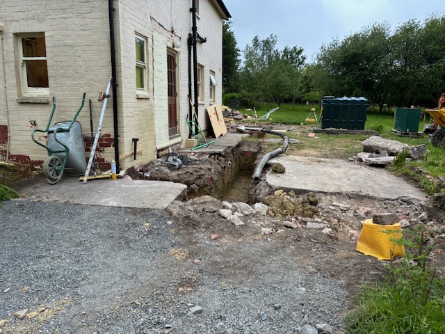 Groundworks excavation with drainage and services being laid